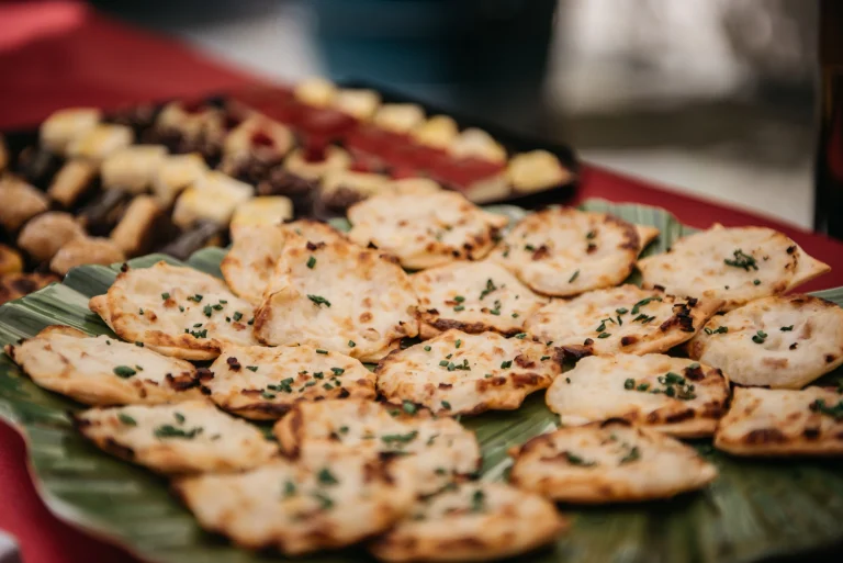 Sar V Sri wedding caterers in chennai featuring mini vegetarian Naan breads with melted cheese and fresh chives