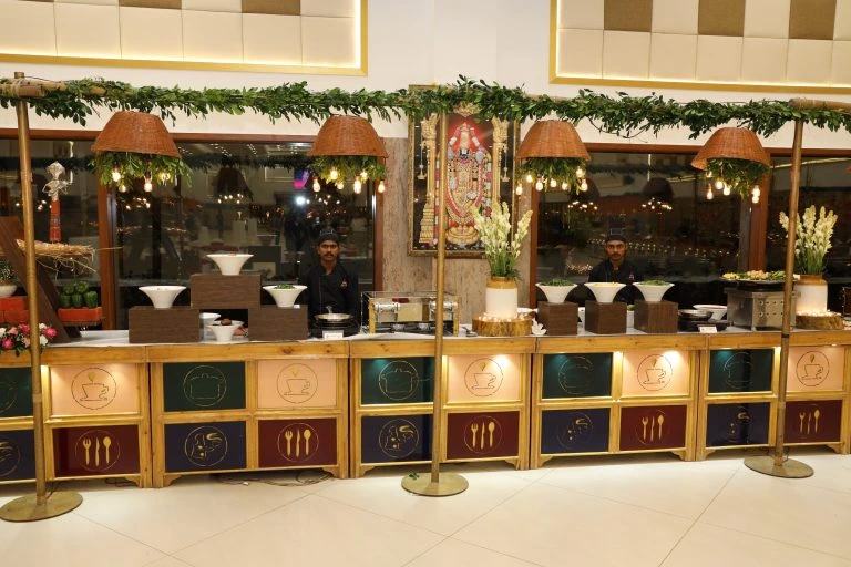 Elegant pure veg buffet counter setup by Sarvsri catering in Chennai, featuring traditional decor