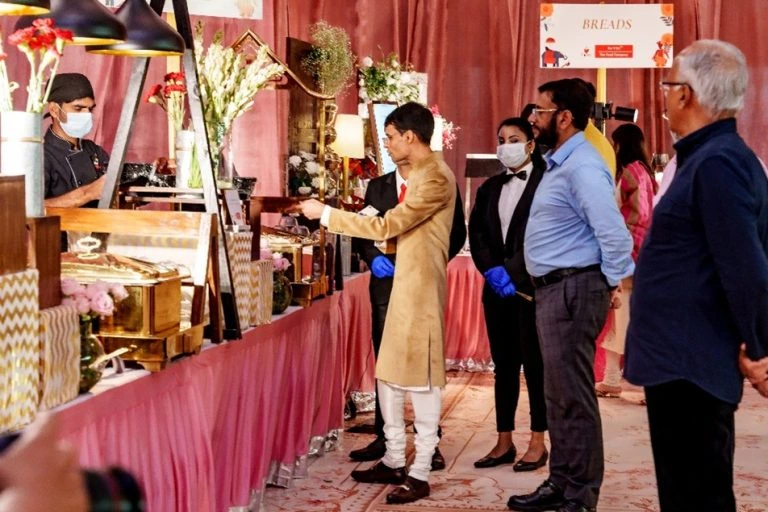 Guests enjoying a premium pure veg buffet at a corporate event in Chennai catered by Sarvsri