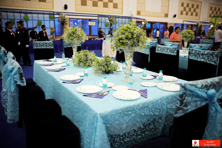 Elegant dining setup for bride and groom family by professional food catering services