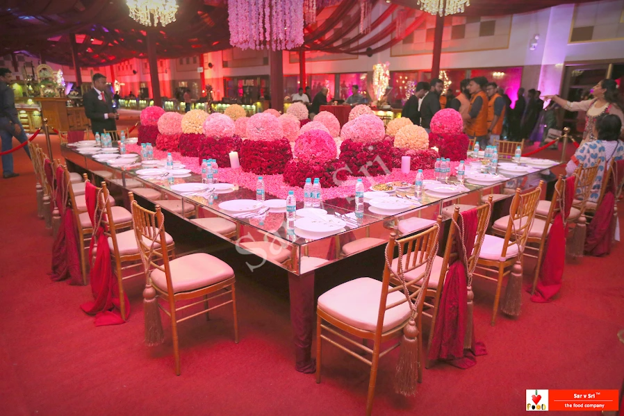 Floral seating setup for engagement celebration, curated by Sar V Sri’s catering team