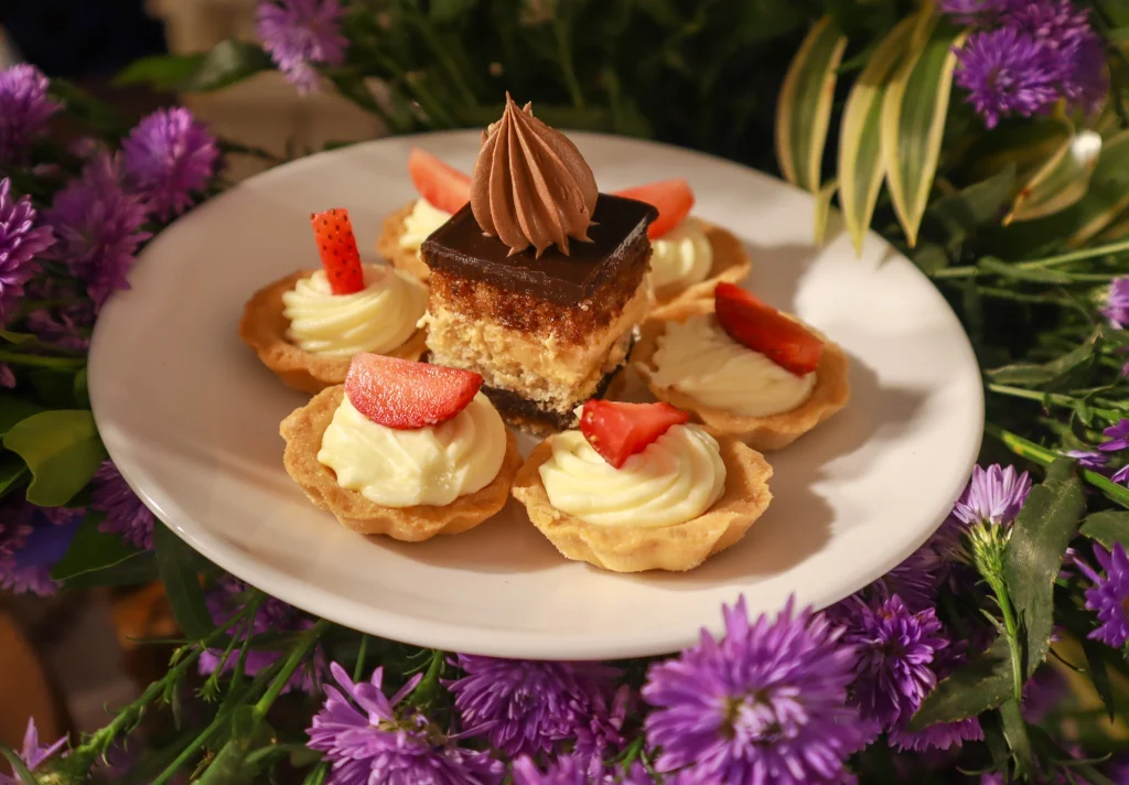 Gourmet mini desserts with strawberries for birthday party catering services by Sar V Sri