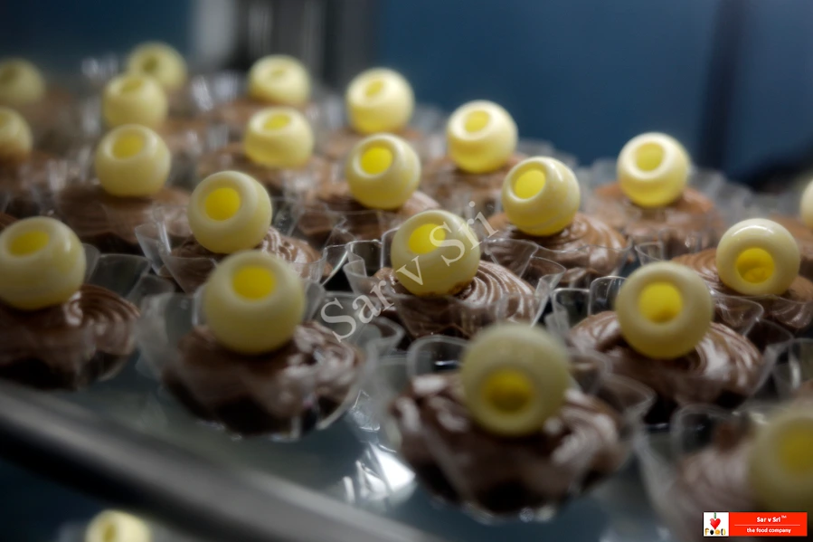 Individual chocolate dessert cups prepared for birthday catering by Sar V Sri