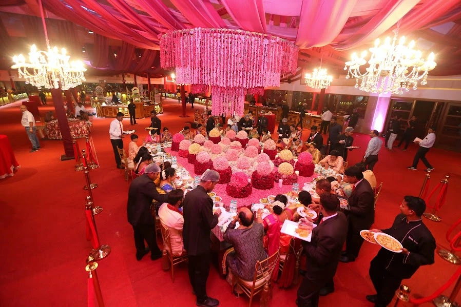 Luxurious floral dining table setup for engagement celebration by Sar V Sri