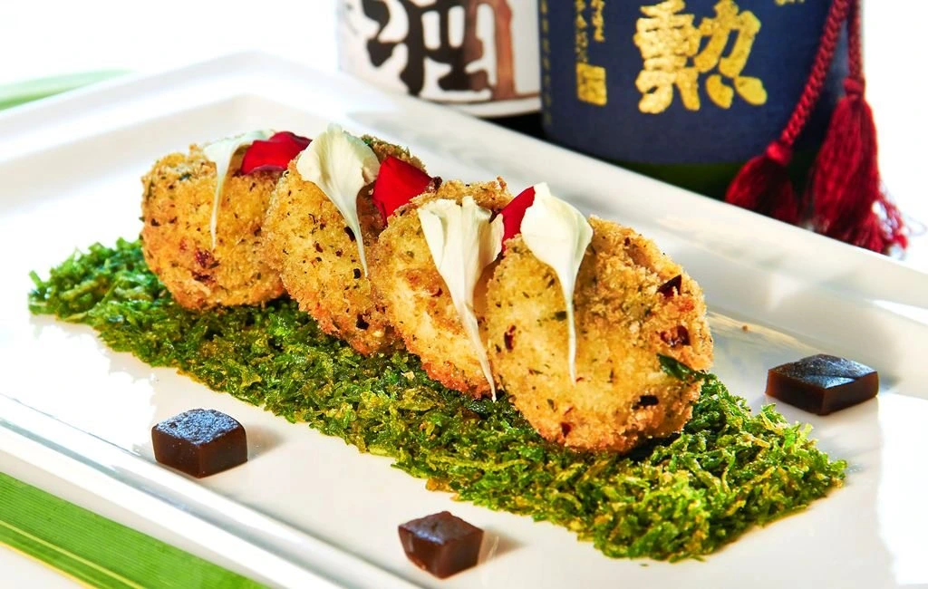 Crispy Pan Asian vegetable cutlets served with greens and sauce served by sar v sri pan asian catering services