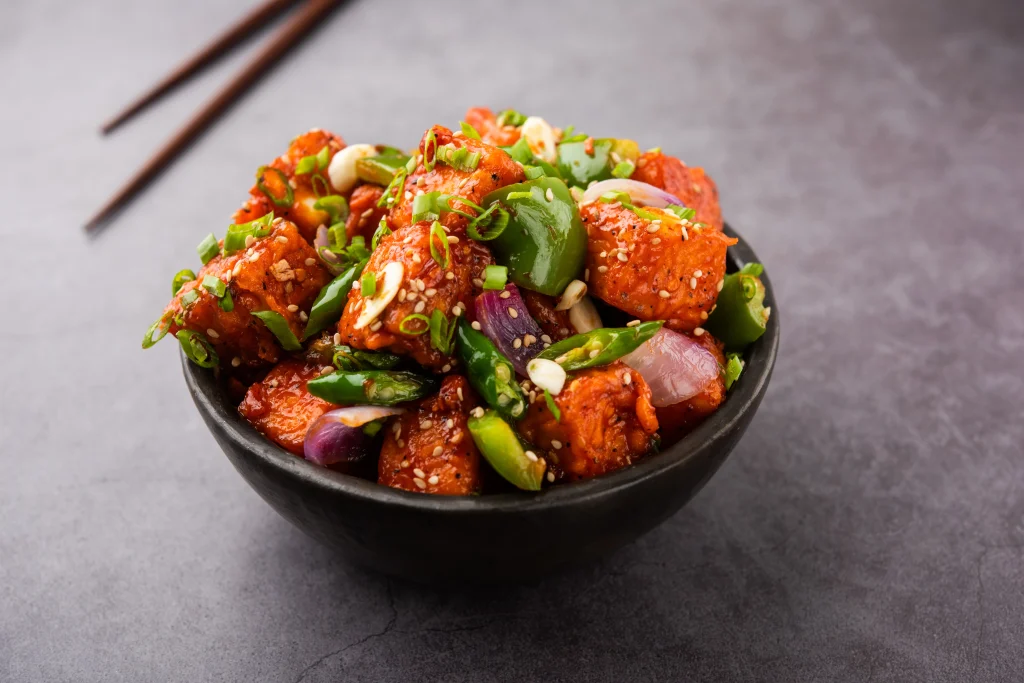Indo-Chinese Chilli Paneer starter by Sar V Sri Catering, featuring crispy fried paneer cubes tossed with bell peppers